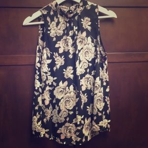 Sleeveless high neck blouse